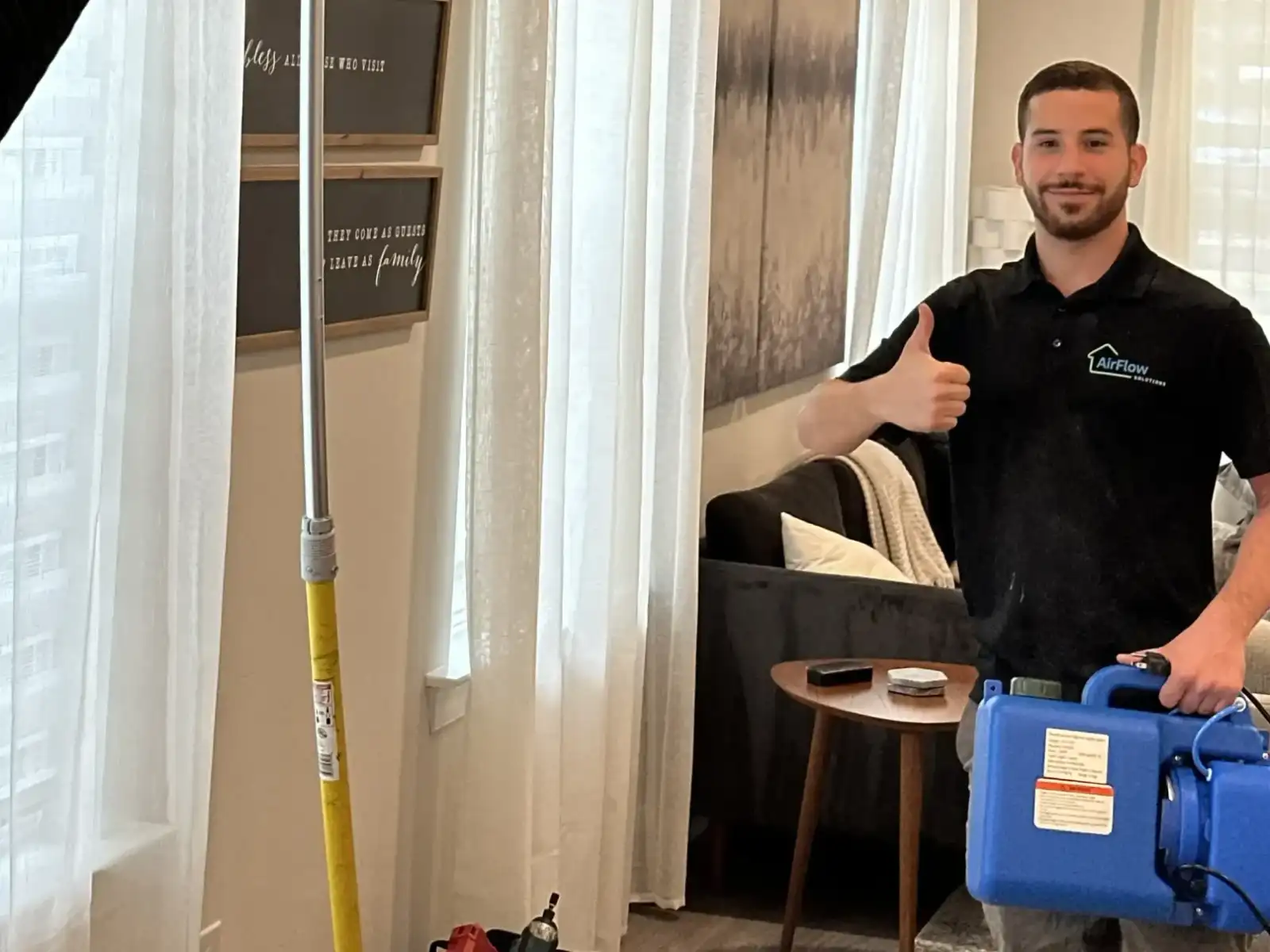 AirFlow Solutions technician with air duct cleaning equipment